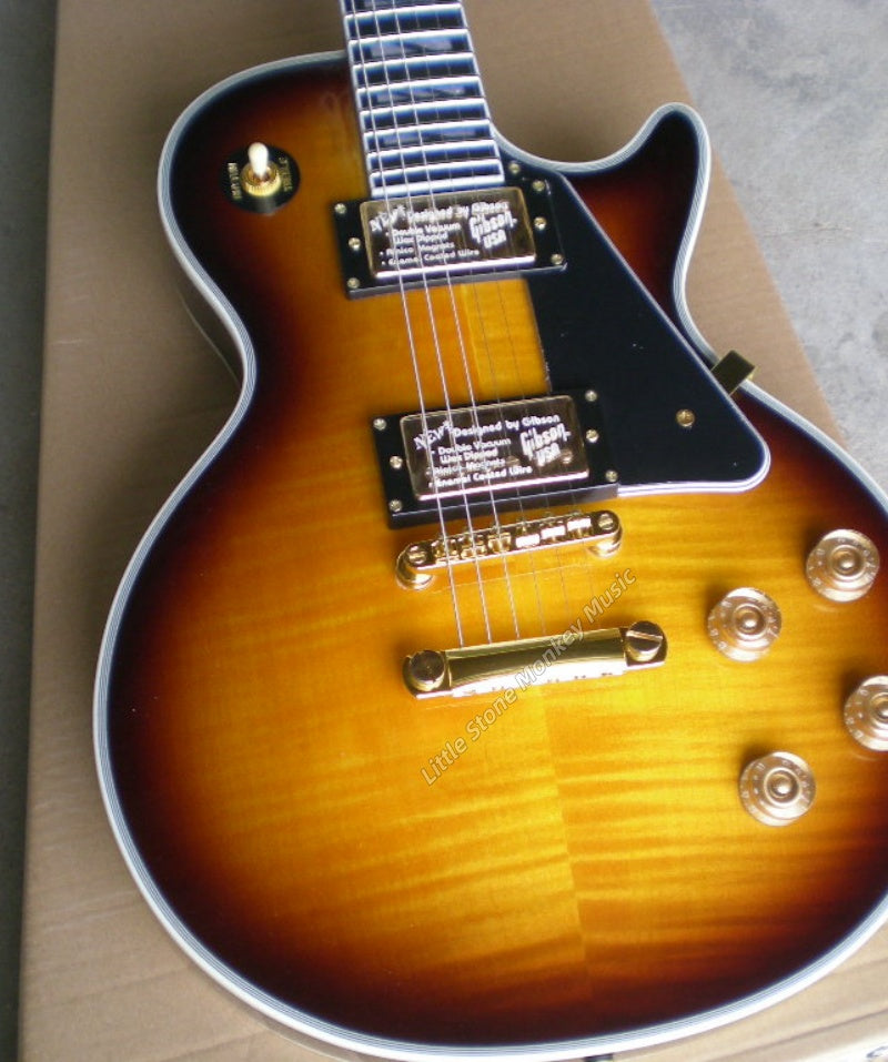New Custom High Quality Electric Guitars Electric guitar with brown yellow tiger pattern maple top and gold hardware with tone-pro bridge Sunburst445