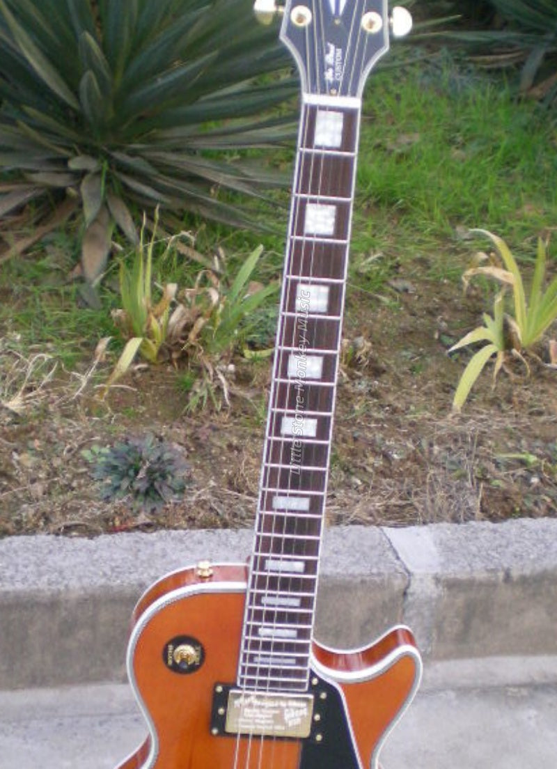 High Quality  Electric Guitar Factory Customized Electric Guitar LP Style Electric Guitar Cream Yellow Mahogany Body Alnico 482