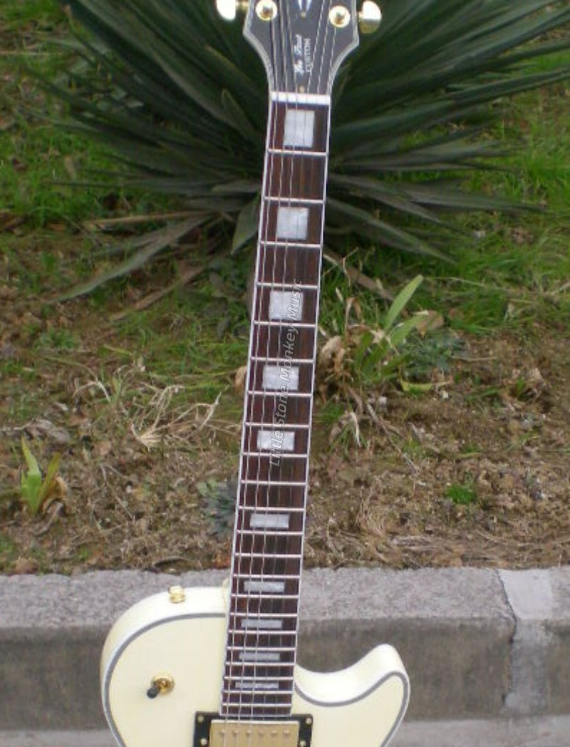 High Quality  Electric Guitar Factory Customized Electric Guitar CustomCustom LP Style Electric Guitar Cream Yellow Mahogany Body Alnico484