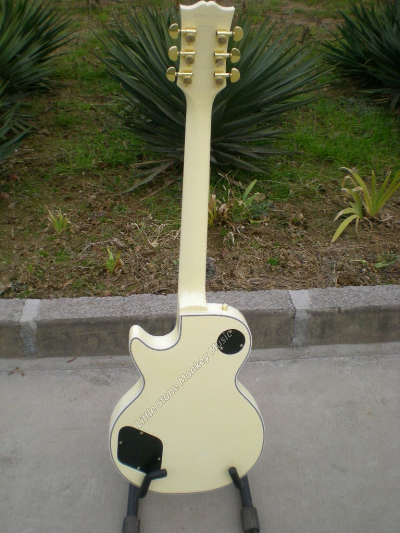 High Quality  Electric Guitar Factory Customized Electric Guitar CustomCustom LP Style Electric Guitar Cream Yellow Mahogany Body Alnico484