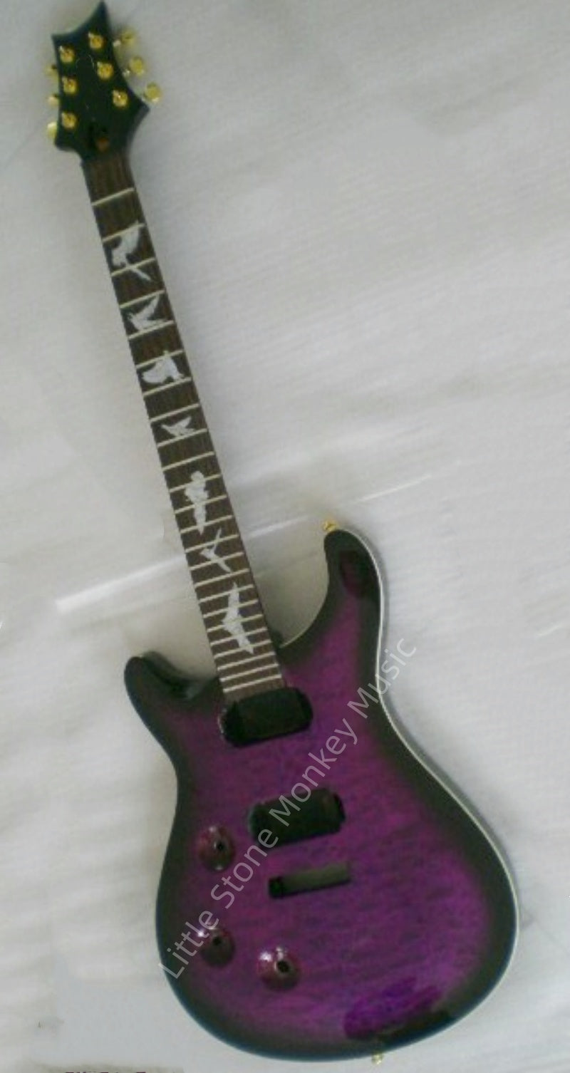 Custom PRS classic streamlined double-cutaway body, purple gradient quilted maple veneer, bird's-eye maple inlay fingerboard  PRS Z33#