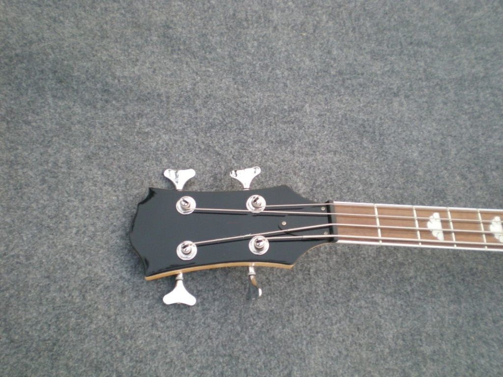 Customize High Quality Irregular Bass Mockingbird Style 4 String Electric Bass Guitar Trans Black Quilted Maple Center Top PJ Pickups Cloud Inlay Heavy Metal Solid Bass BC   Special Design