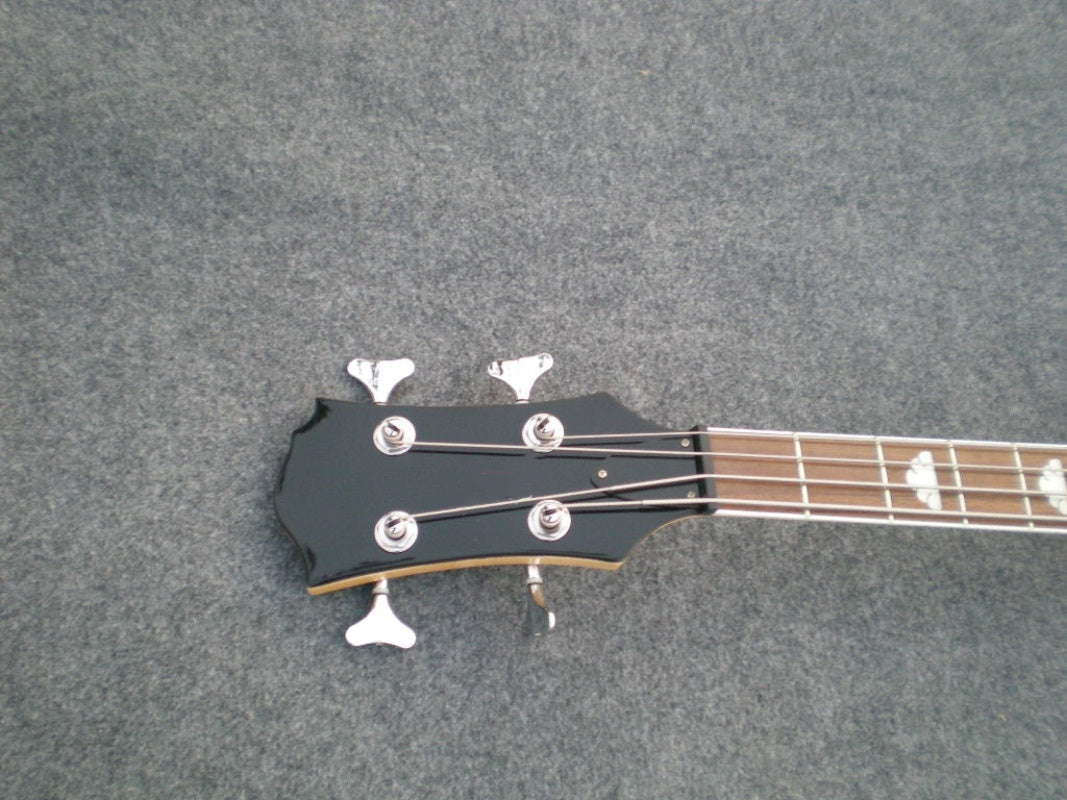 Customize High Quality Irregular Bass Mockingbird Style 4 String Electric Bass Guitar Trans Black Quilted Maple Center Top PJ Pickups Cloud Inlay Heavy Metal Solid Bass BC   Special Design