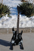 Electric Guitar With Sun And Moon Patterns