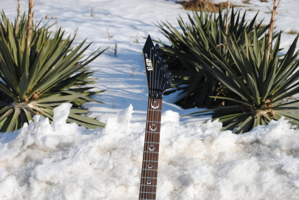 Electric Guitar With Sun And Moon Patterns
