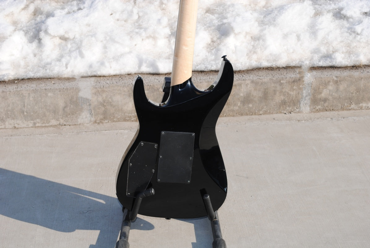 Electric Guitar With Sun And Moon Patterns